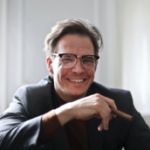 A professional male leader with smile