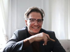 A professional male leader with smile