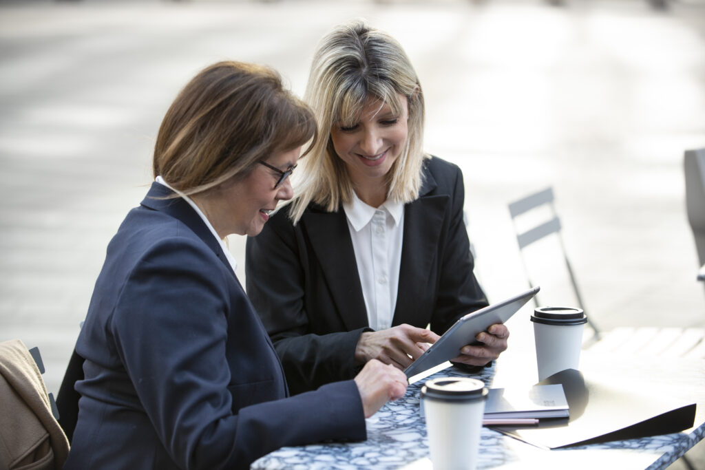 two women in discussion about finance strategies for law firms in GTA