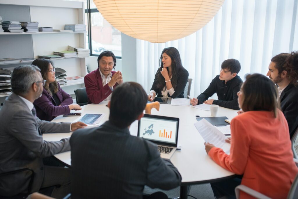 meeting of a group of people on their laptops and discussing and gaining skills from the best entrepreneurship microcredentials in ontario